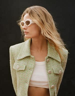 Tweed jacket with pearl buttons