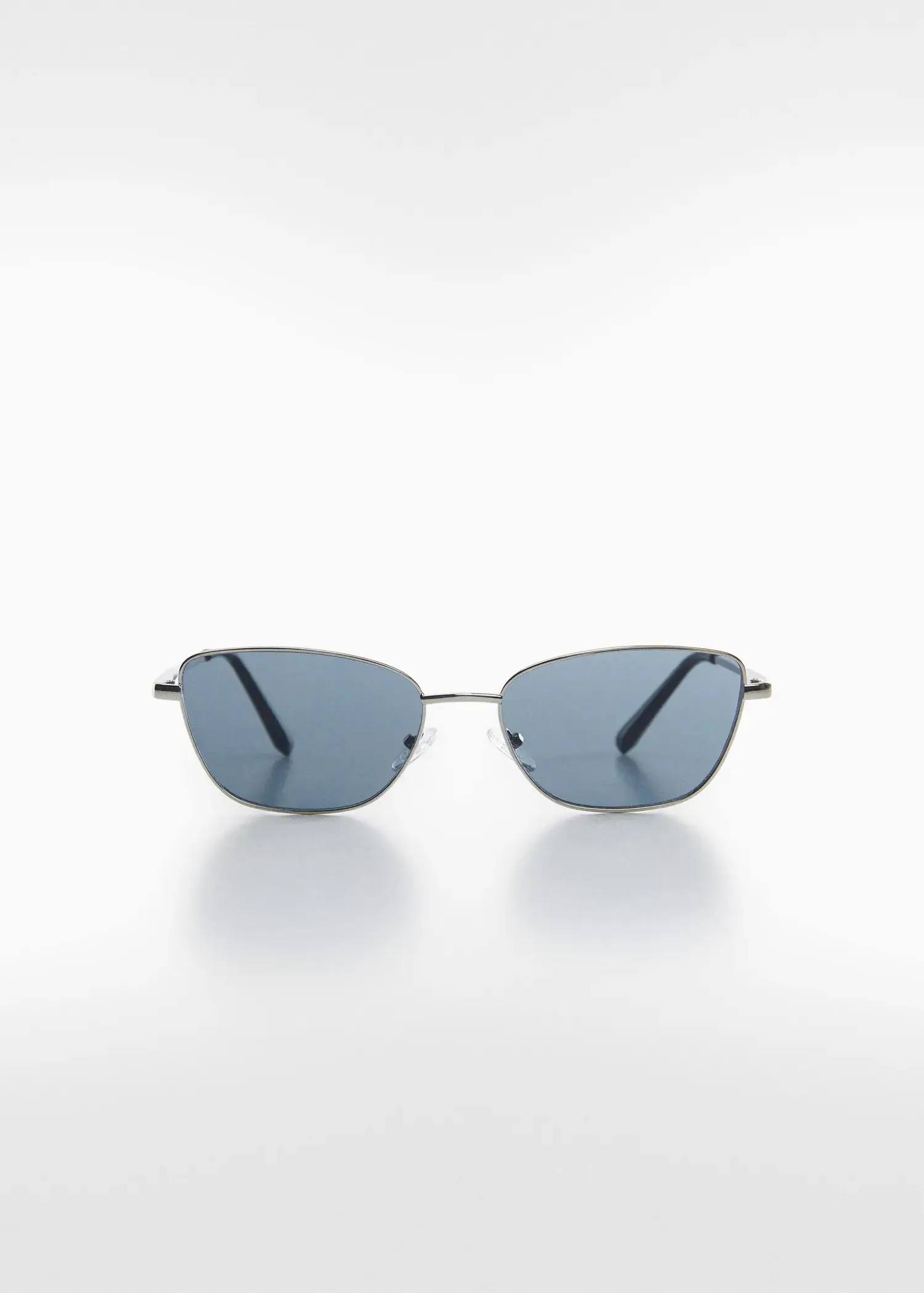 Mango Metal bridge sunglasses. a close up of a pair of glasses on a white surface 
