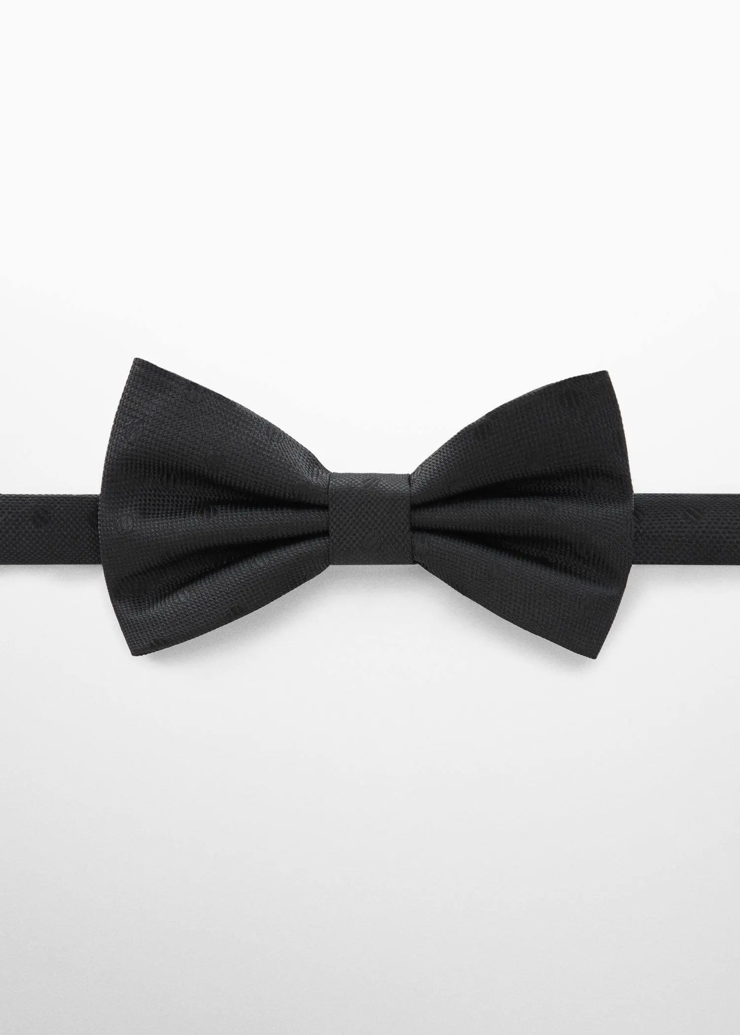 Mango Bow tie with polka-dot structure. a black bow tie on a white background. 