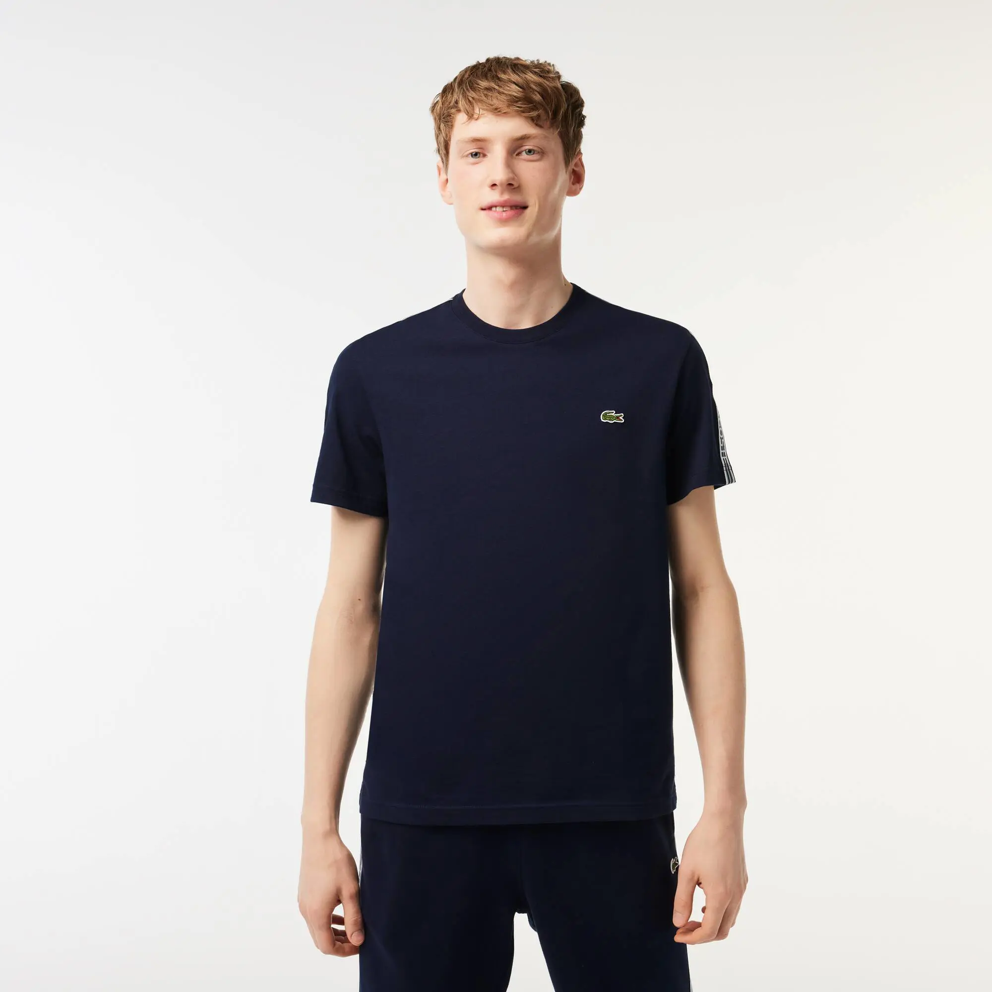 Lacoste Camiseta de hombre Lacoste regular fit con raya con logo. 1
