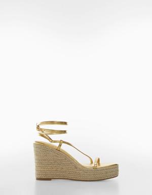 Metallic wedge sandals with straps 