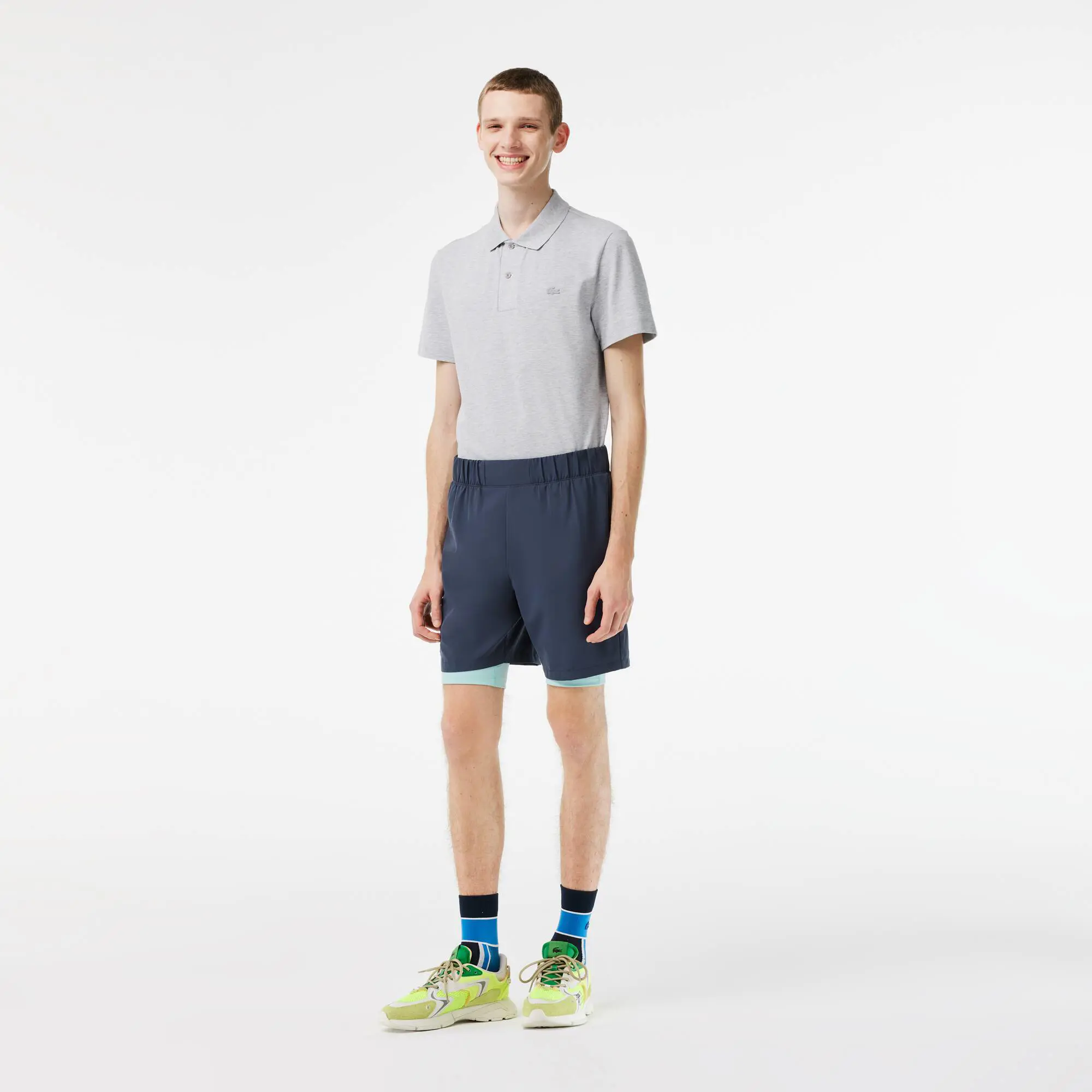 Lacoste Men’s Two-Tone Lacoste Sport Shorts with Built-in Undershorts. 1