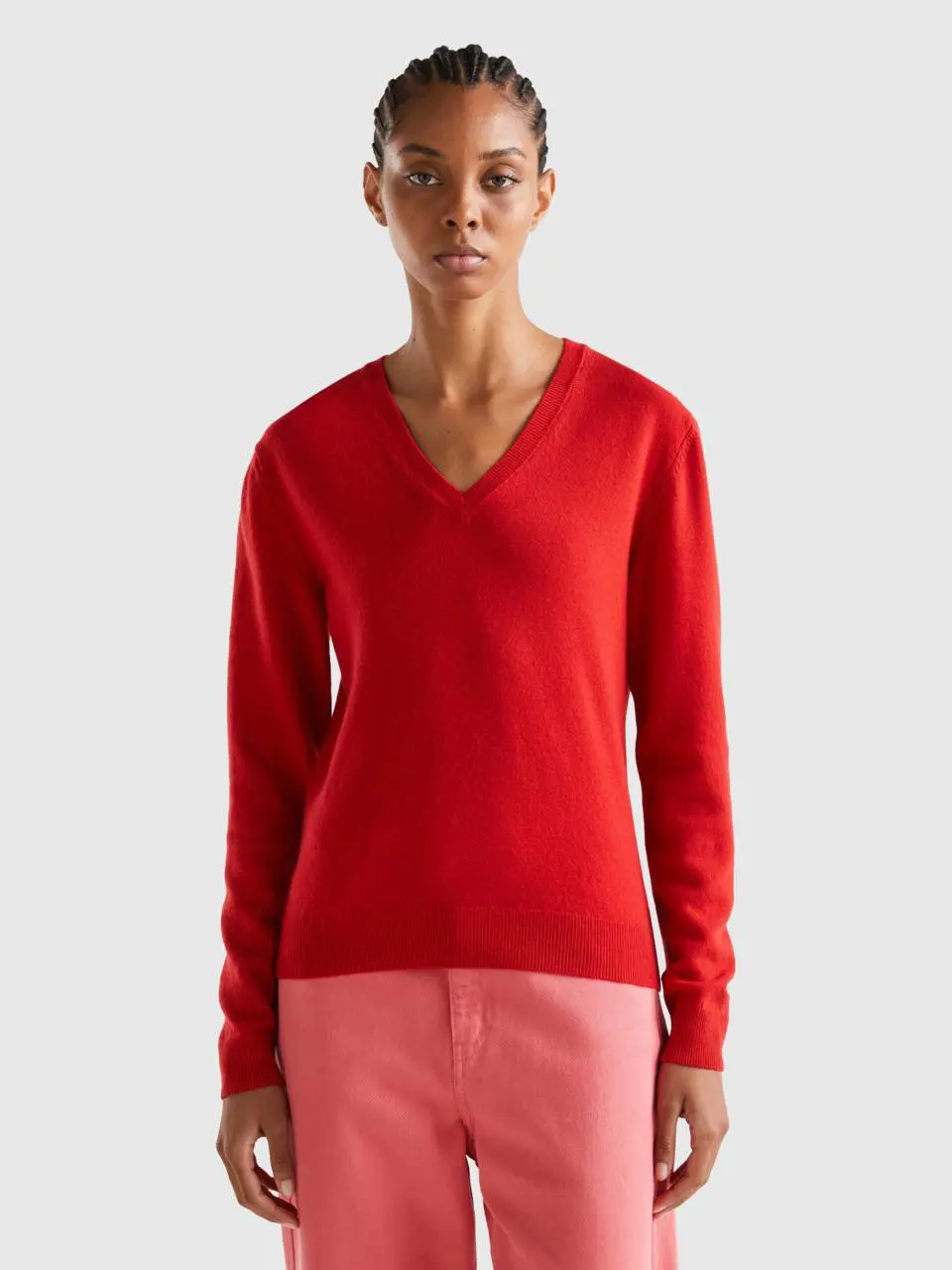 Benetton red v-neck sweater in pure merino wool. 1