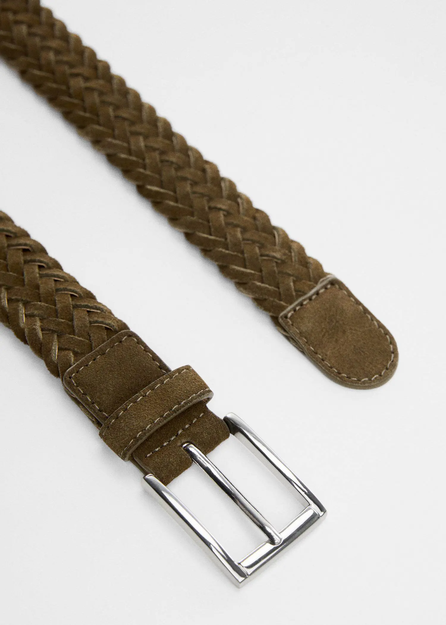 Mango Braided suede belt. a close-up of a brown belt with a silver buckle. 