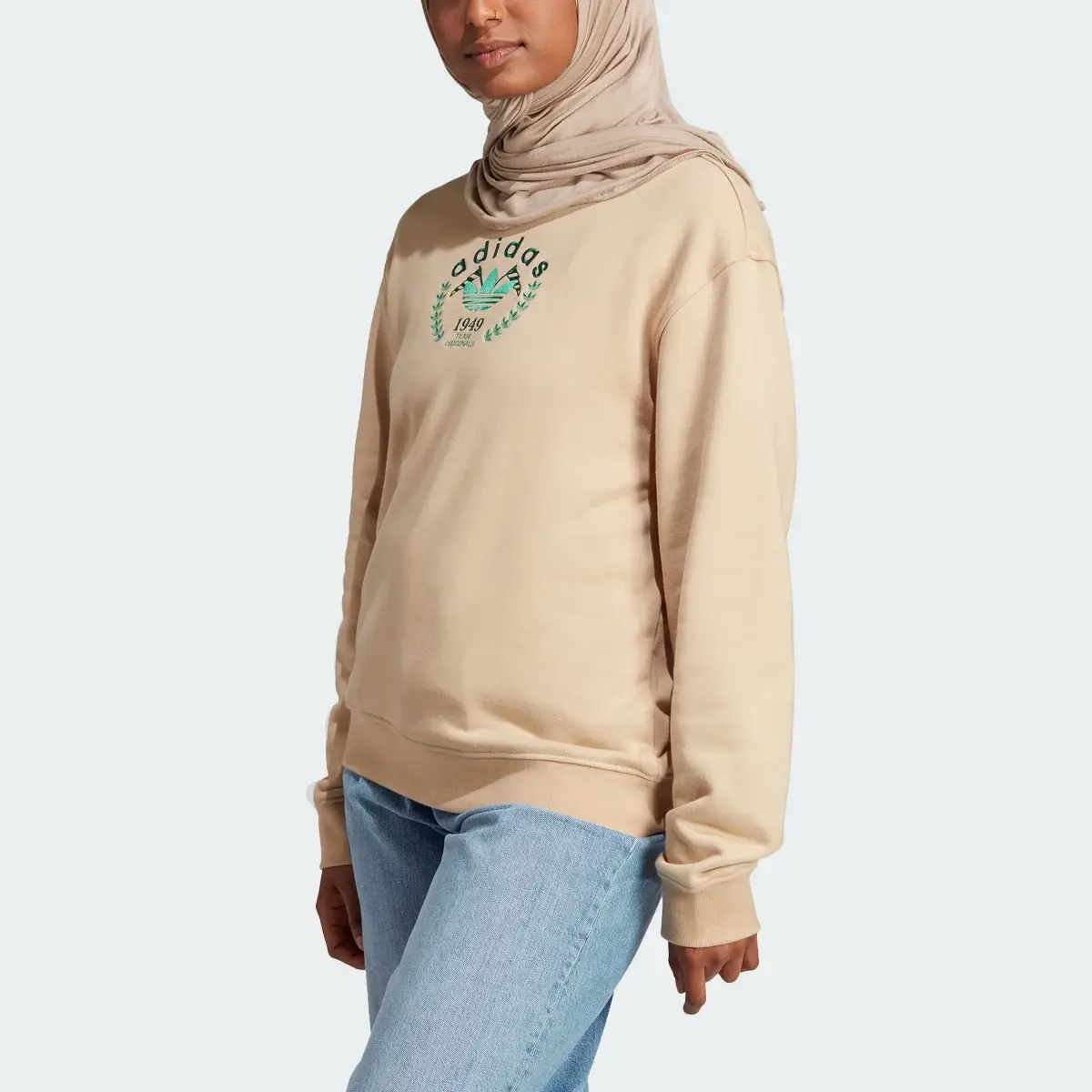 Adidas Crest Embroidery Sweatshirt. 1