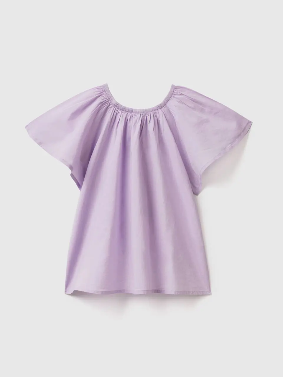 Benetton blouse in cotton with flaps. 1