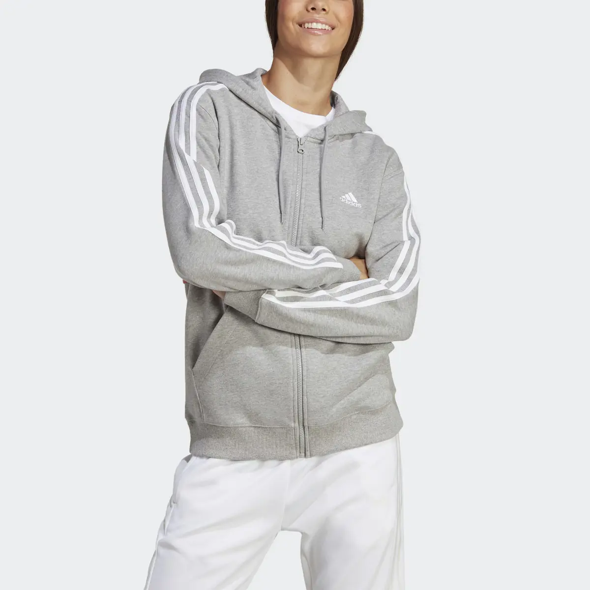 Adidas Chaqueta con capucha Essentials French Terry Regular 3 bandas. 1