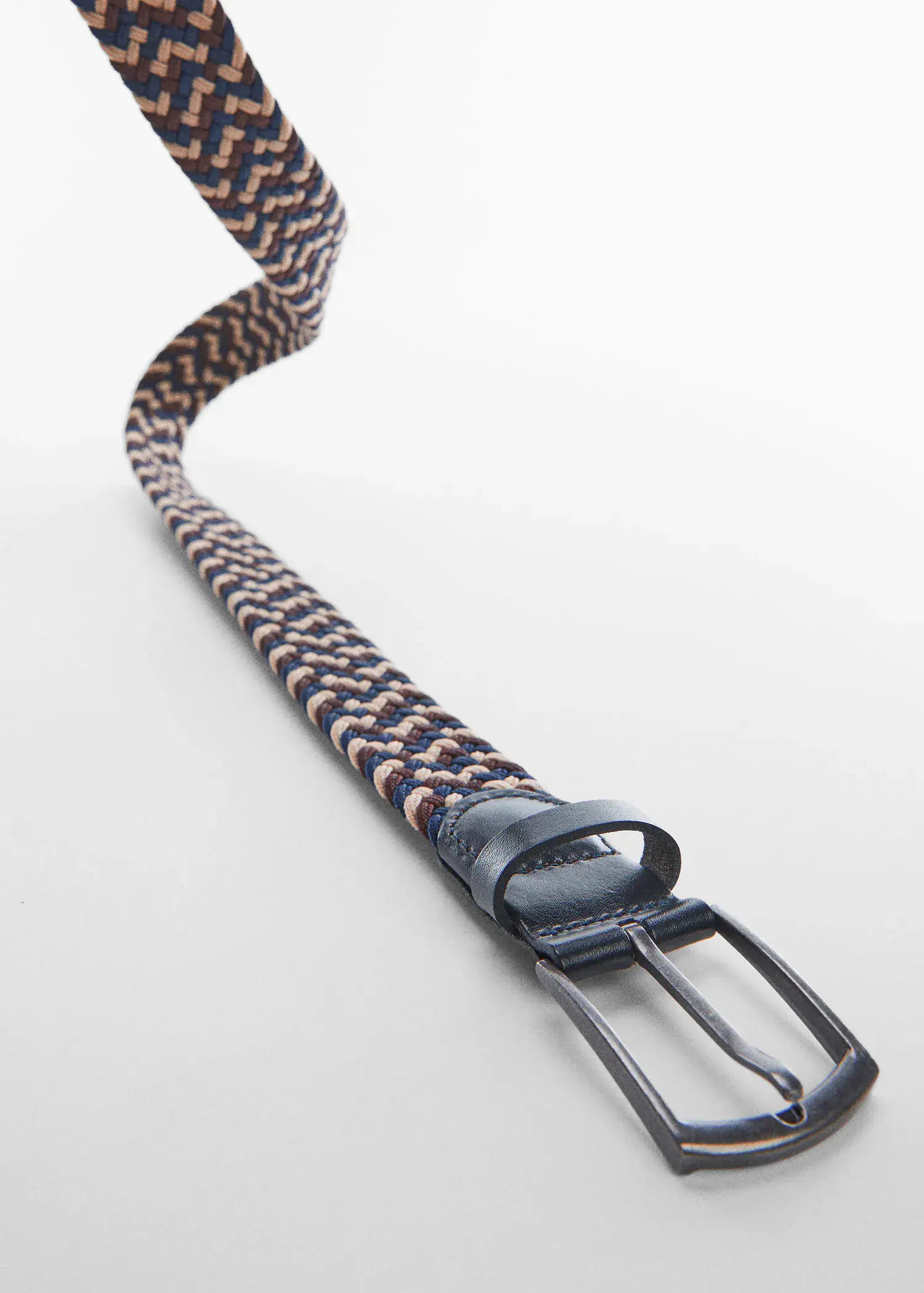 Mango Braided elastic colored belt. a close-up of a belt with a black buckle. 