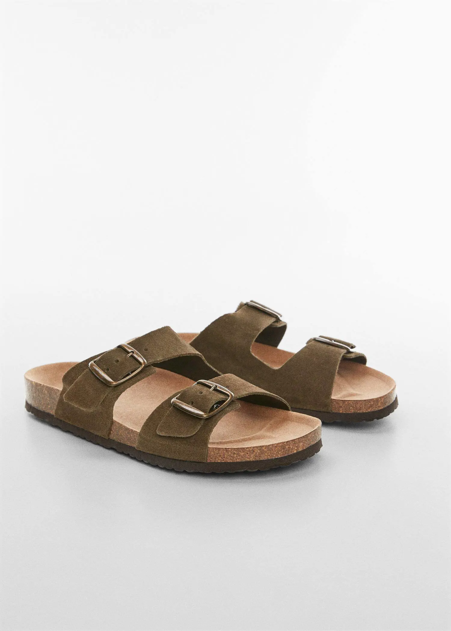 Mango Split leather sandals with buckle. a pair of brown sandals on top of a white surface. 