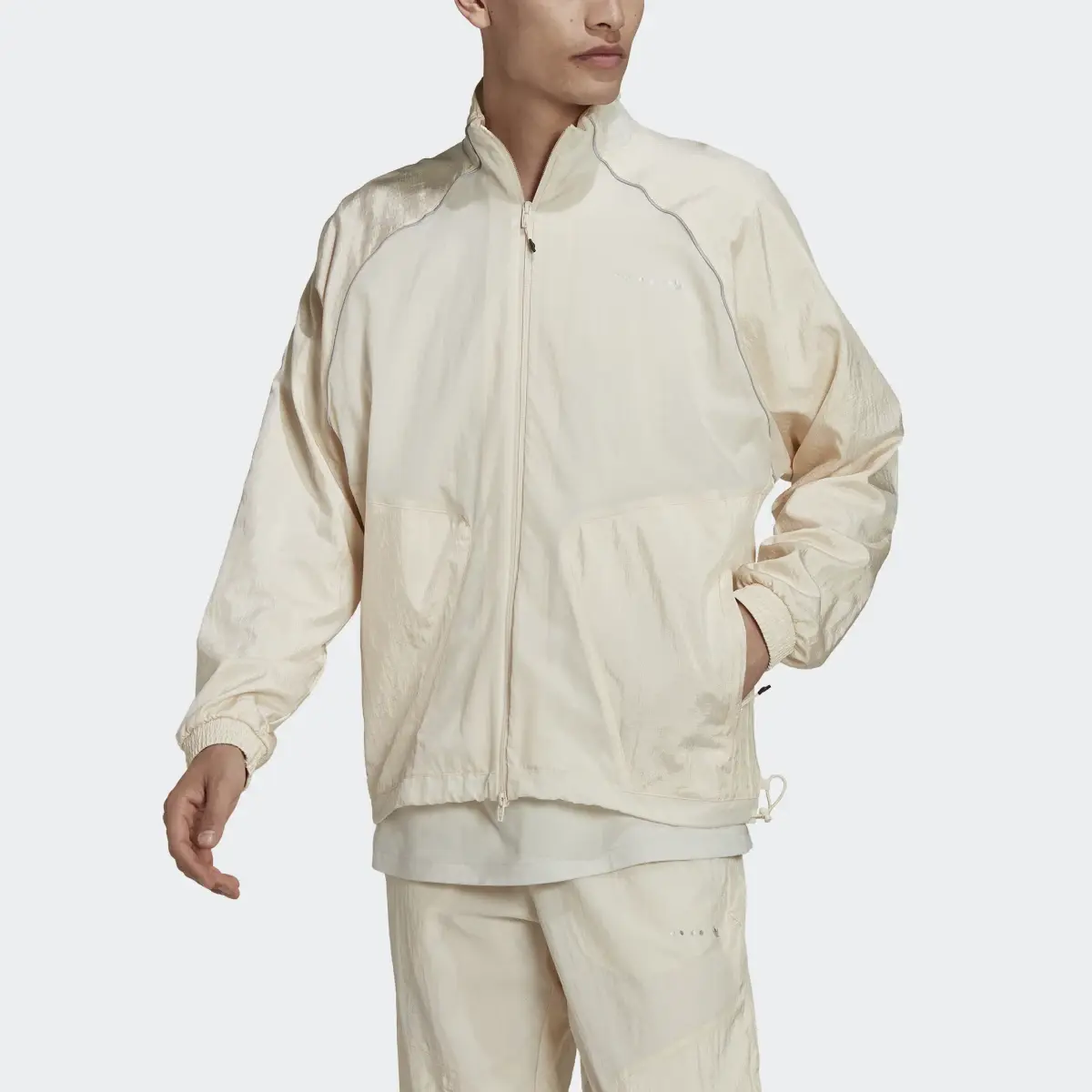 Adidas Reveal Material Mix Track Jacket. 1