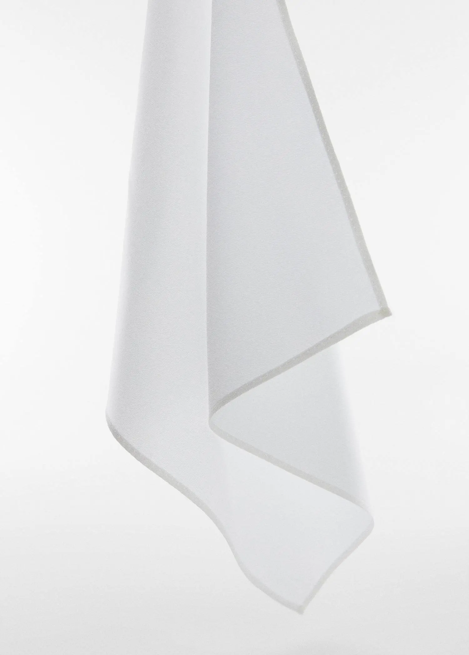 Mango Plain recycled polyester scarf. a close-up of a white cloth on a white background. 