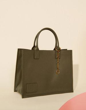 Leather tote bag with chain jewelry