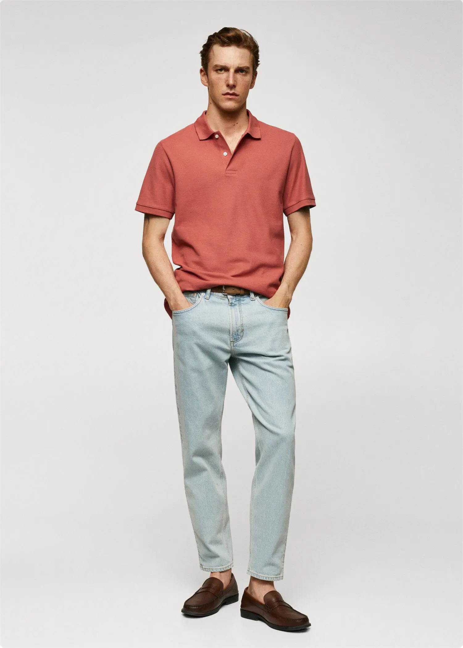Mango 100% cotton pique polo shirt. a man in a red shirt and blue pants. 