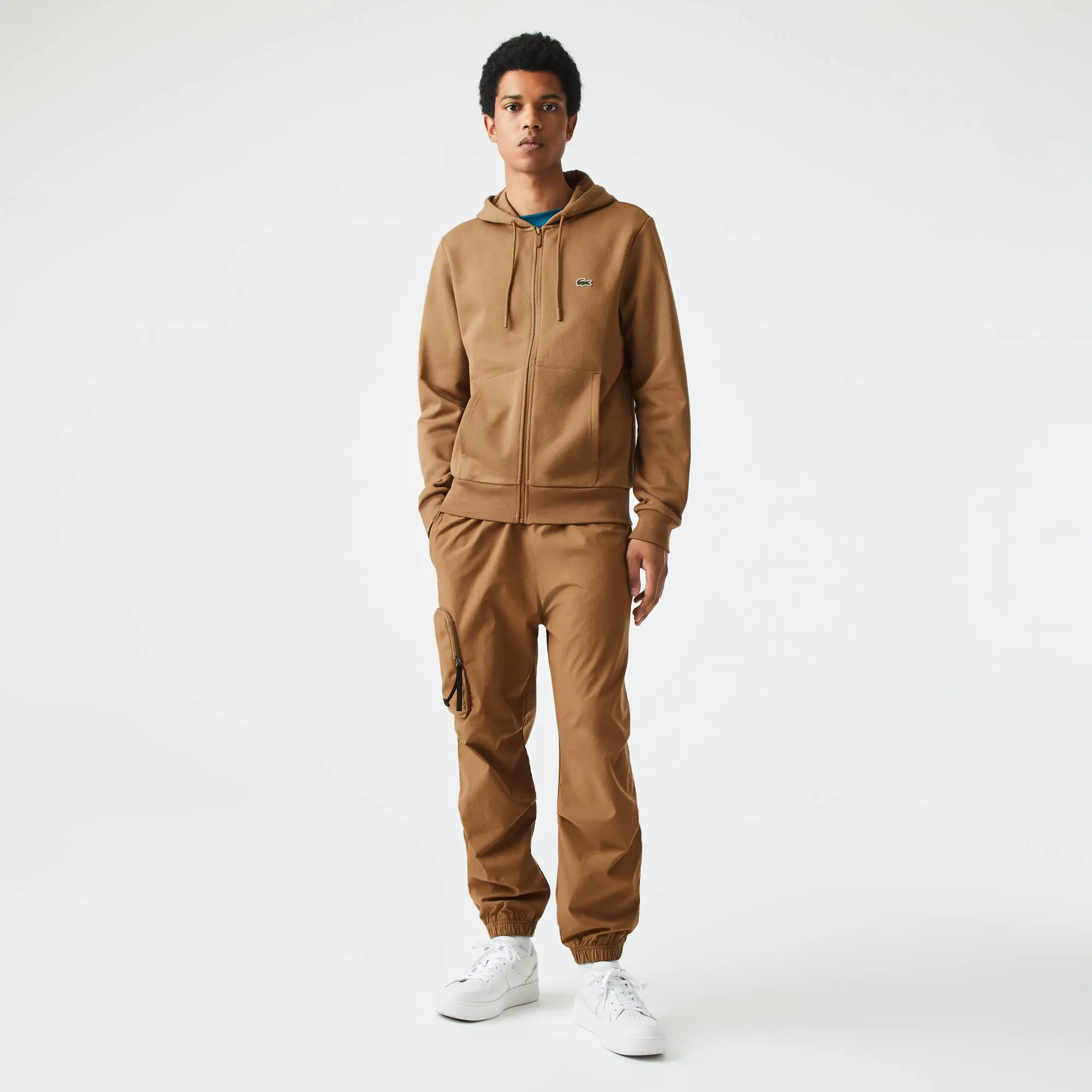 Lacoste Men's Kangaroo Pocket Zip-Up Fleece Hoodie. 1 Lacoste Men's Kangaroo Pocket Zip-Up Fleece Hoodie. 1