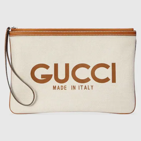 Gucci Clutch with Gucci print. 1