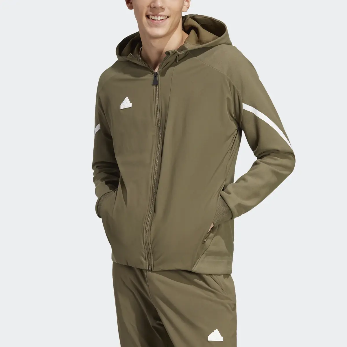 Adidas Veste de survêtement entièrement zippée Designed 4 Gameday Premium. 1