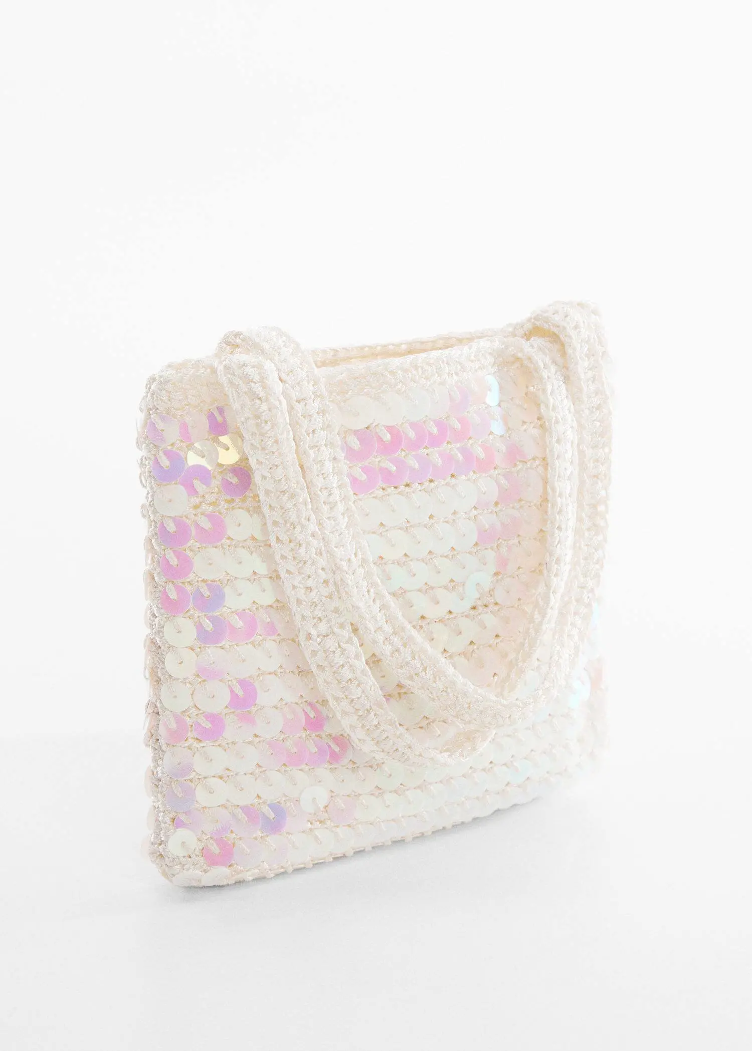 Mango Short-handle sequined bag. a white purse is sitting on a table. 