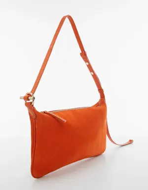 Leather bag with metallic detail