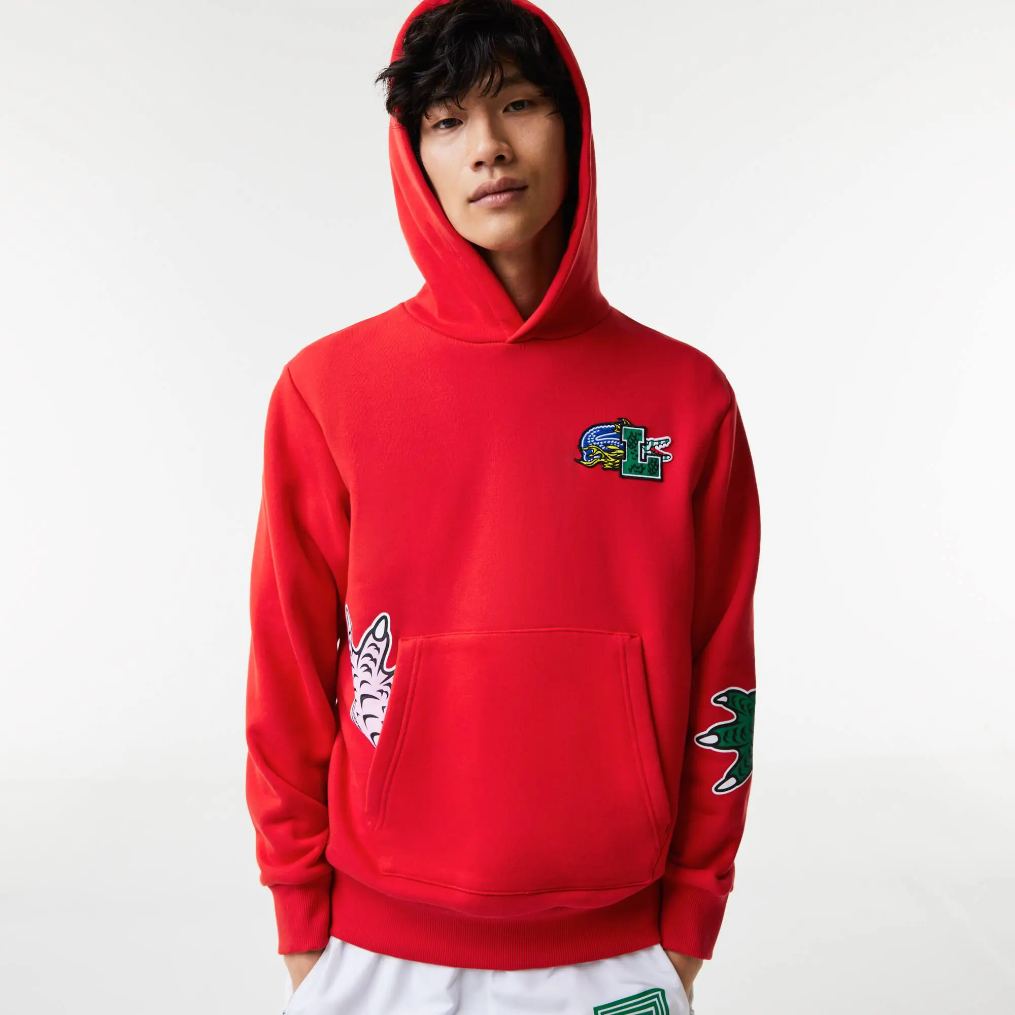 Lacoste Sudadera de hombre Lacoste Holiday con capucha y estampado de efecto cómic. 1