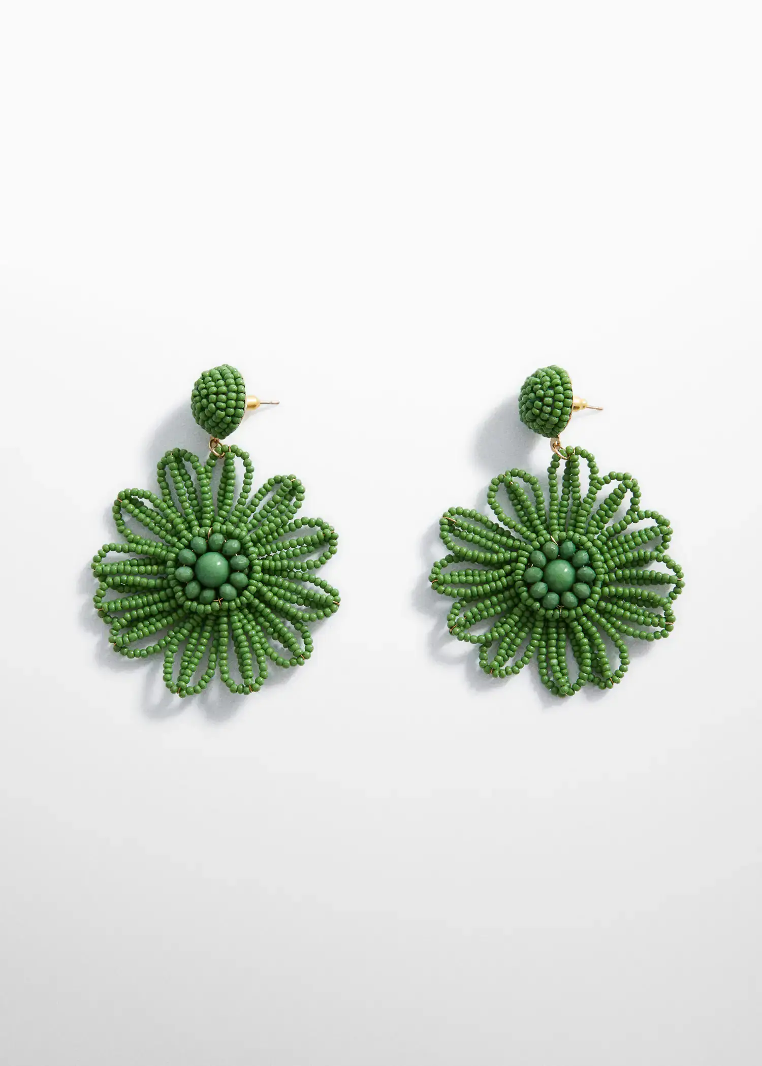 Mango Flower beaded earrings. a pair of green flower earrings on a white background. 