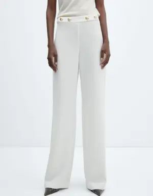Trousers with waist button 