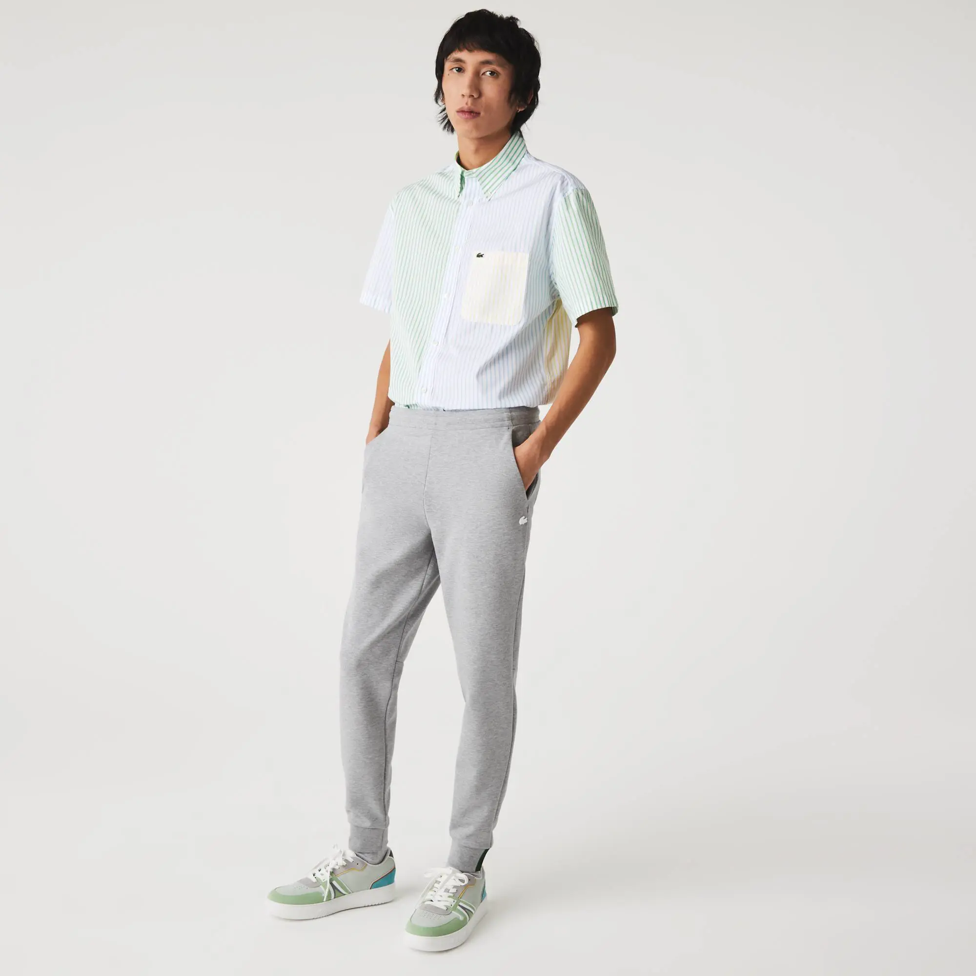 Lacoste Pantalón deportivo para hombre slim fit en mezcla de algodón calefactable. 1 Lacoste Pantalón deportivo para hombre slim fit en mezcla de algodón calefactable. 1