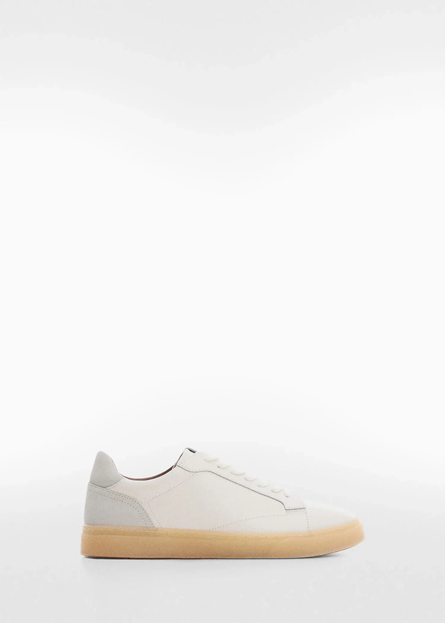 Mango Nappa leather trainers. a pair of white sneakers with a wooden bottom. 