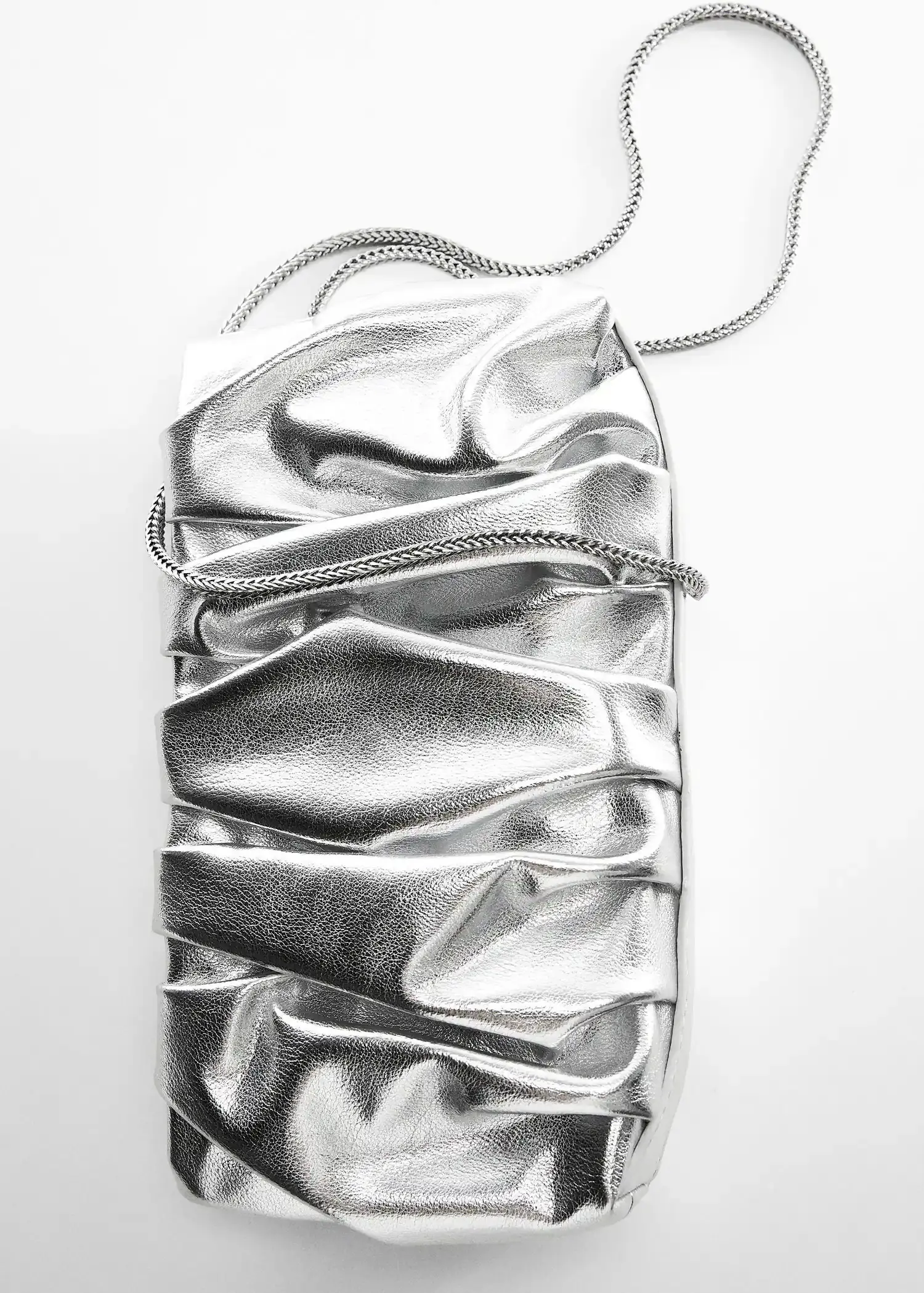 Mango Quilted chain bag. a silver purse is shown on a white surface. 