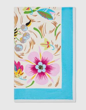 Terrycloth beach blanket with floral print