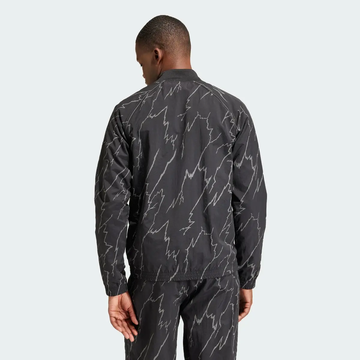 Adidas Allover Print SST Track Top. 3