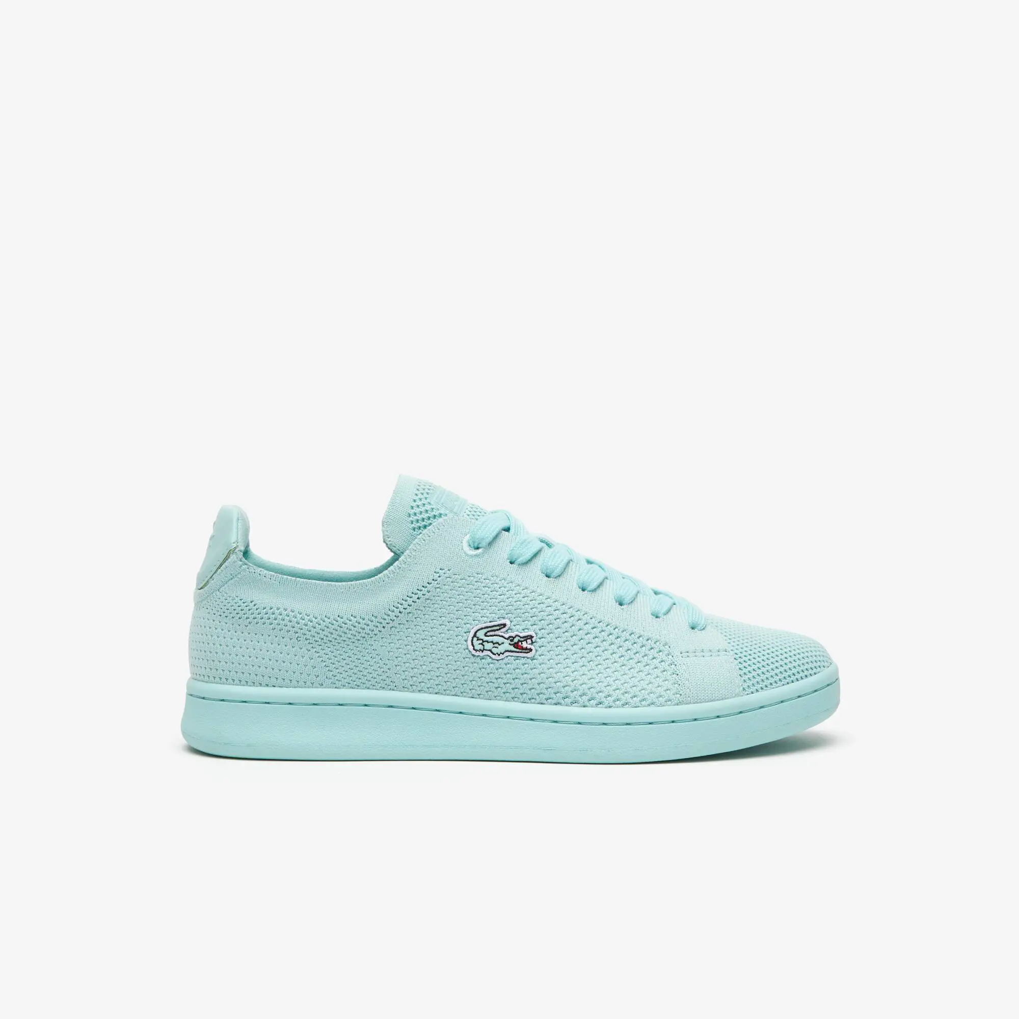 Lacoste Zapatillas de mujer Lacoste Carnaby en tela piqué con talón colorido. 1