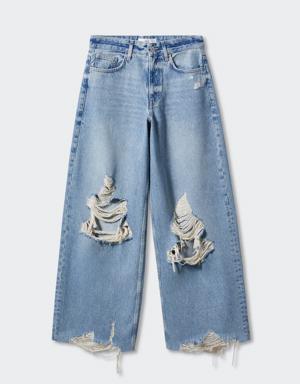 Jeans wideleg com pormenores rotos decorativos