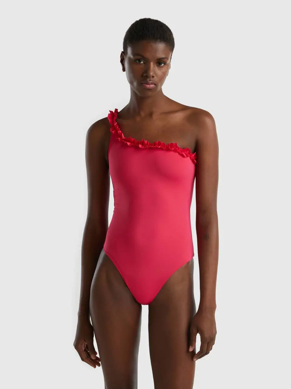 Benetton one-piece swimsuit in econyl® with ruffles. 1