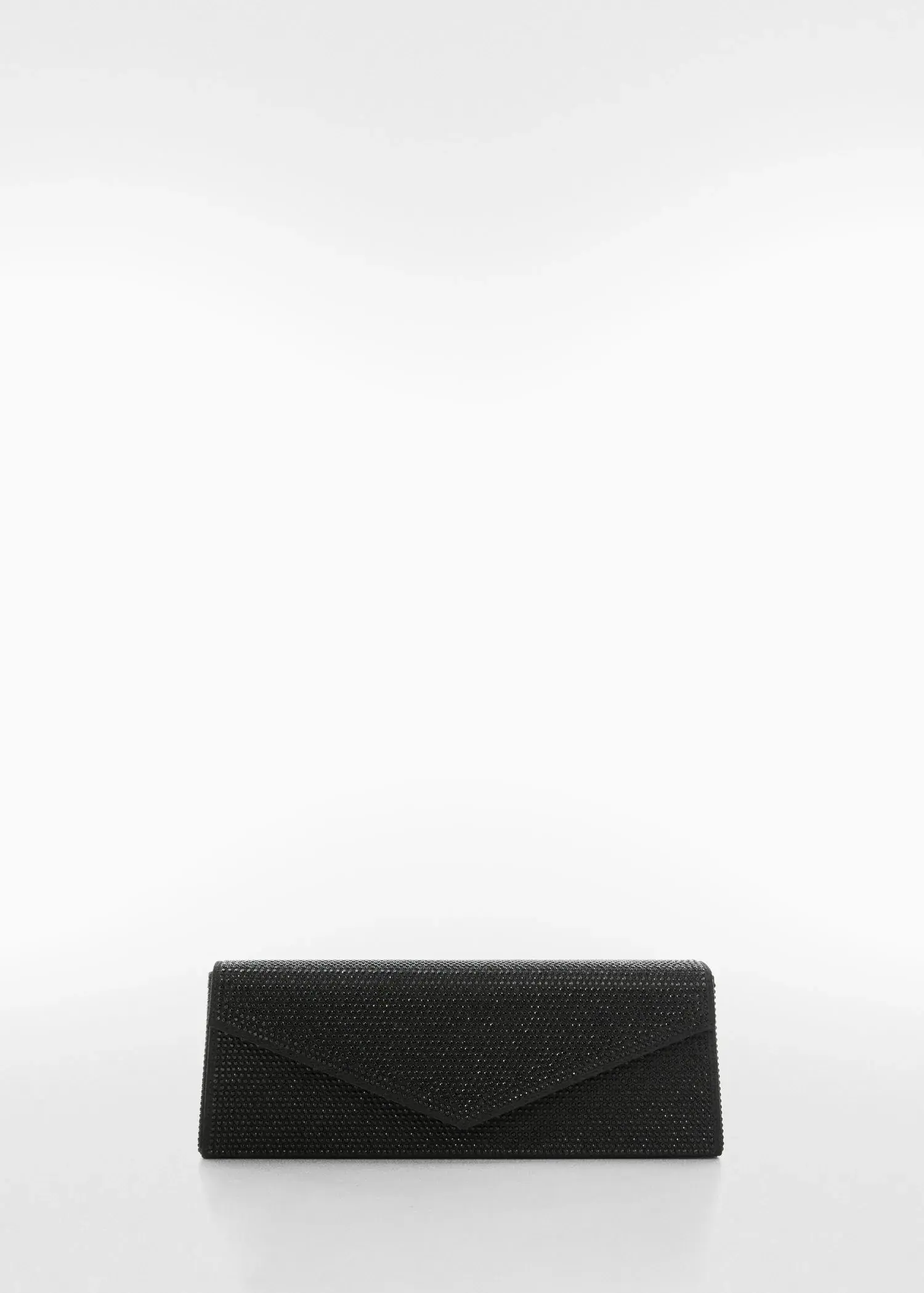 Mango Rigid crystal bag. a black purse sitting on top of a white wall. 