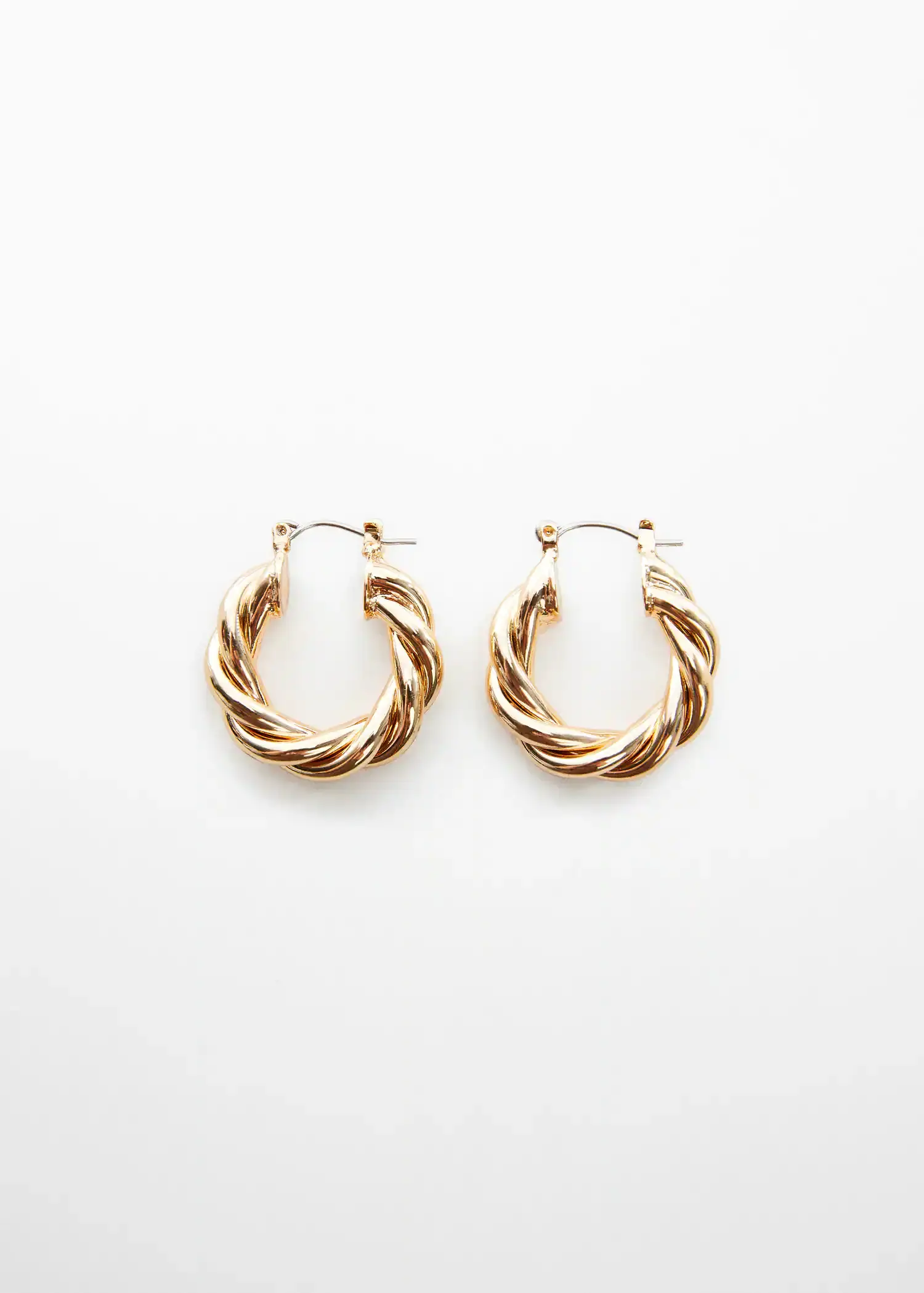 Mango Intertwined hoop earrings. a close up of a pair of earrings 