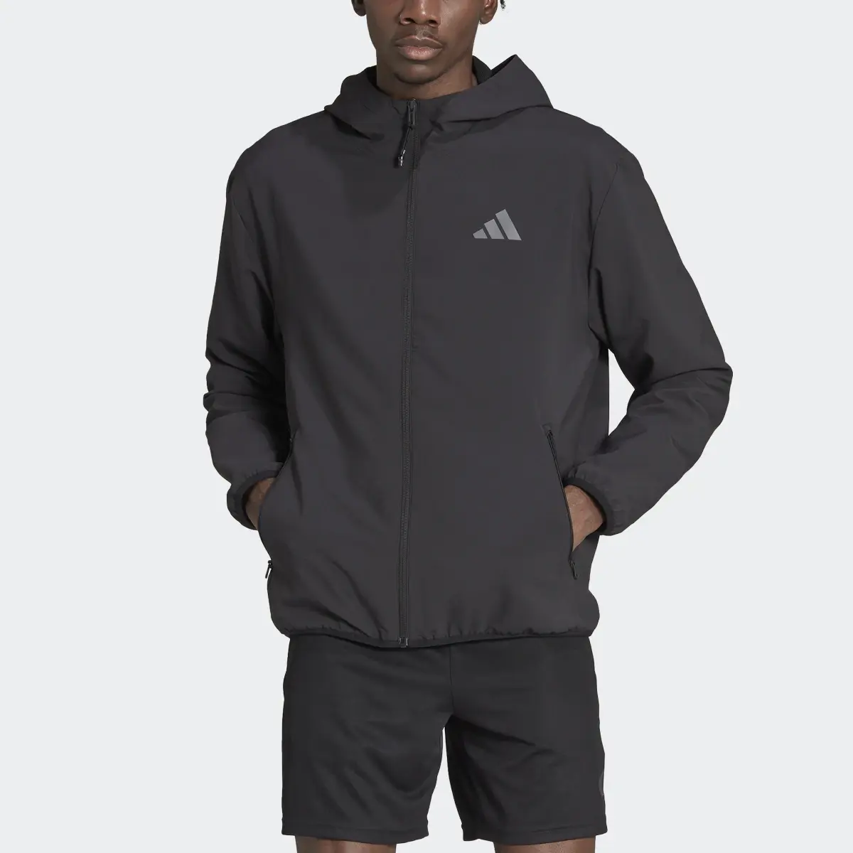 Adidas Train Essentials Seasonal Training Light Jacket. 1