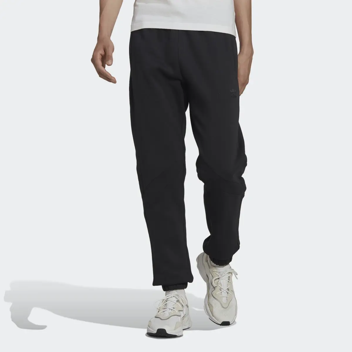 Adidas Rekive Slim Sweat Pants. 1