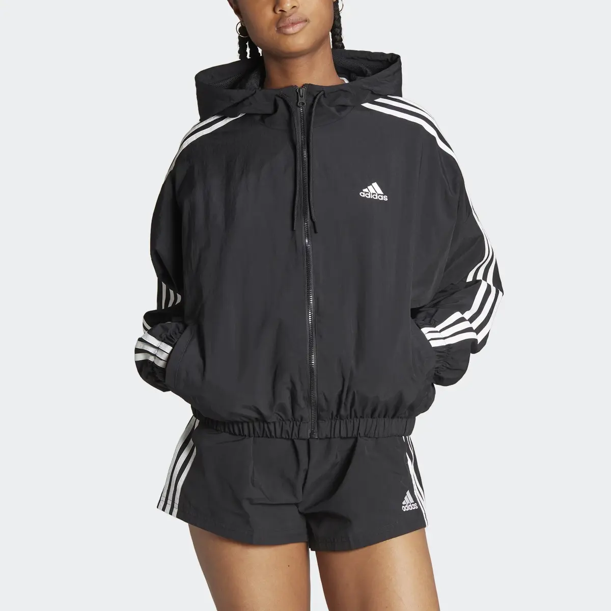 Adidas Essentials 3-Stripes Woven Windbreaker. 1