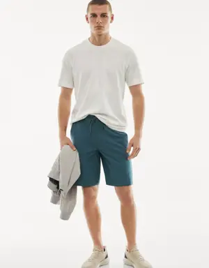 Water-repellent technical bermuda shorts