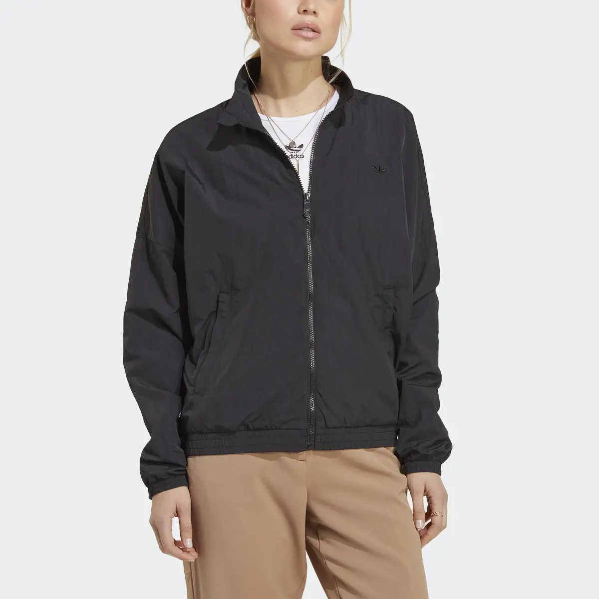 Adidas Chaqueta Premium Essentials Nylon. 1