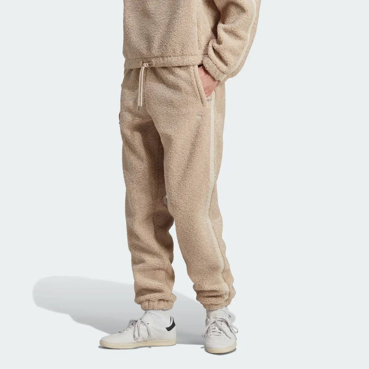 Adidas Premium Essentials Fleece Pants. 1