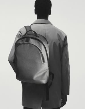 Water-repellent backpack with pockets