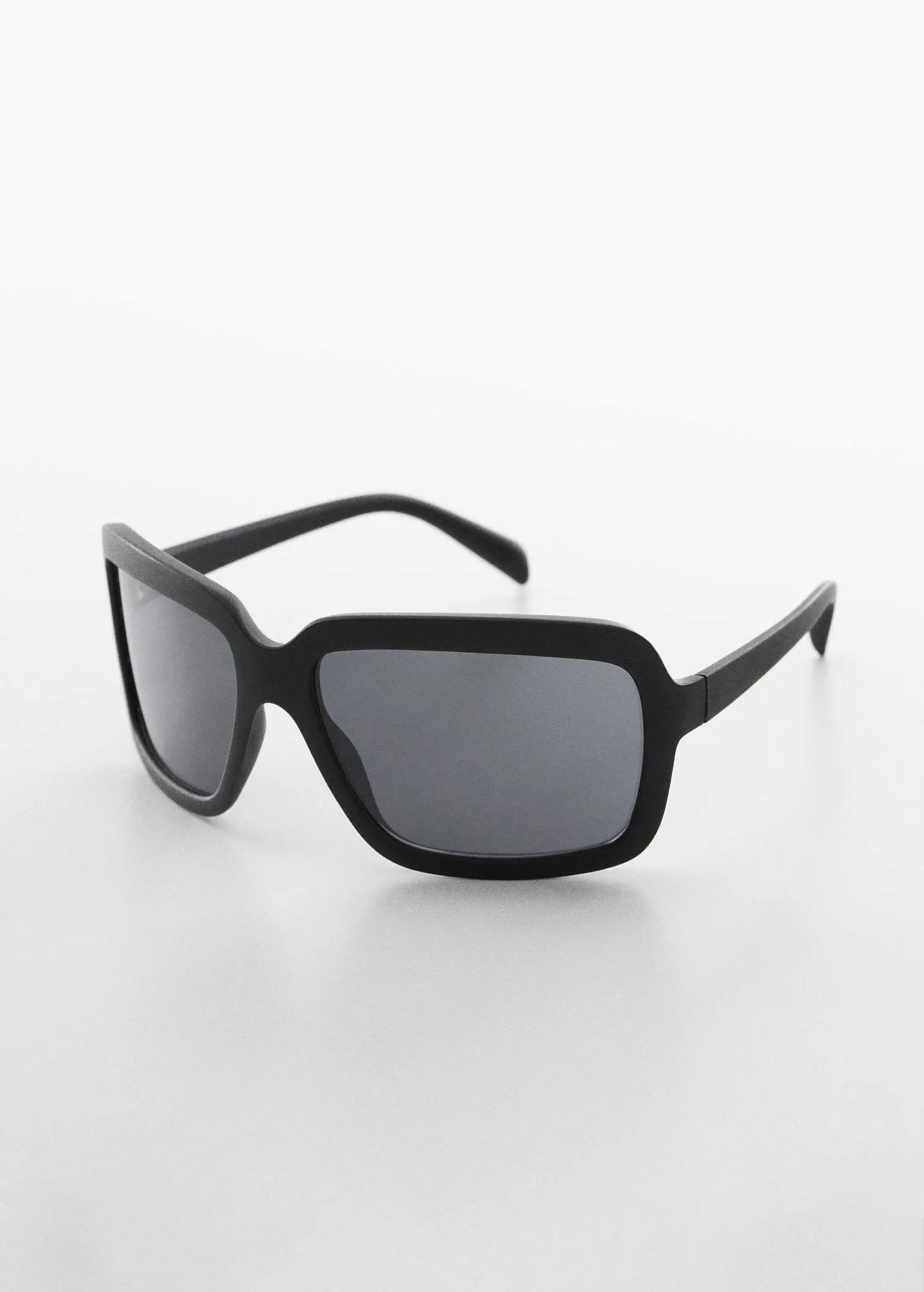 Mango Squared frame sunglasses. a pair of sunglasses on a white surface. 