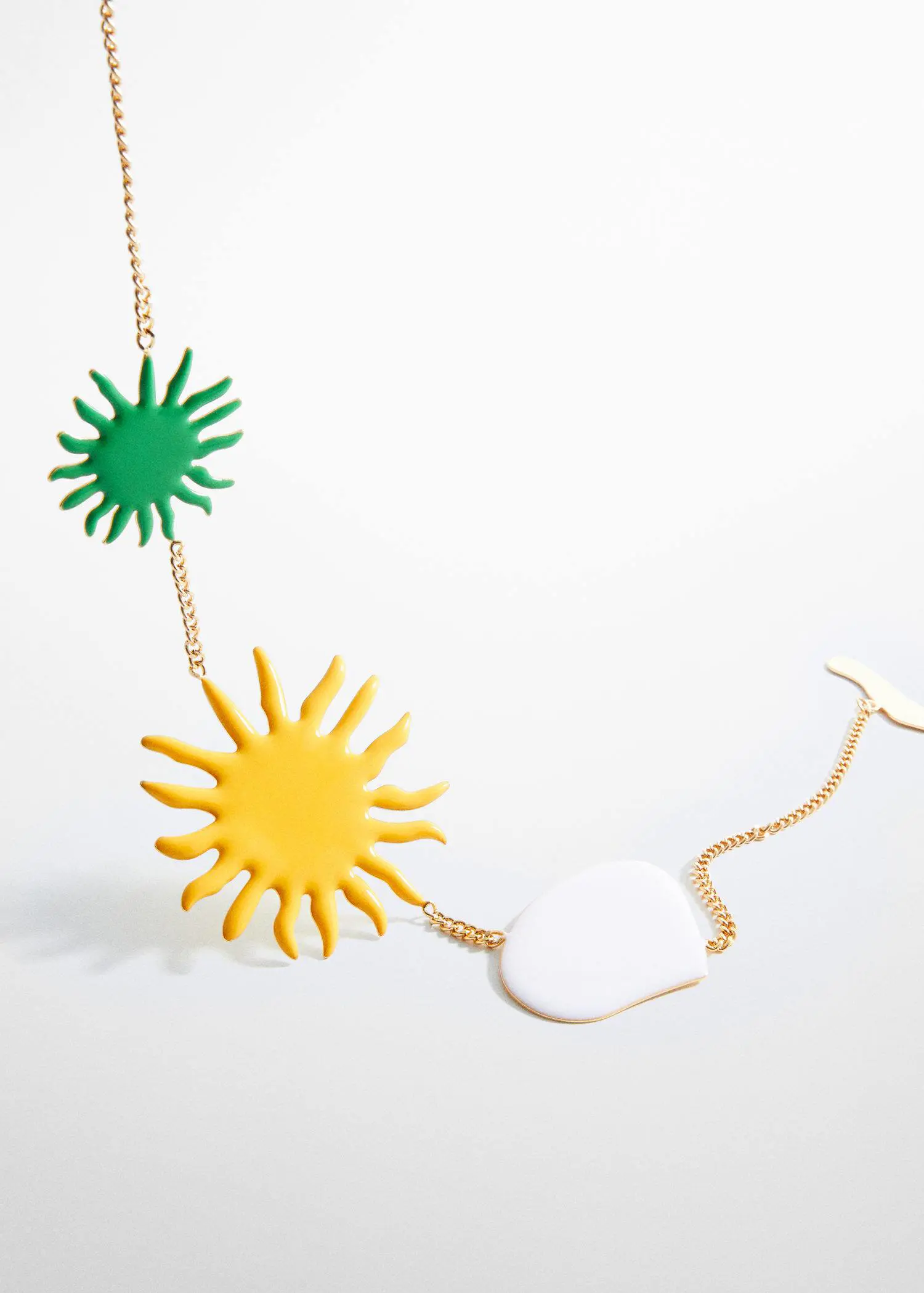 Mango Combined maxi-pendant necklace. a necklace that has a sun and a bird on it. 