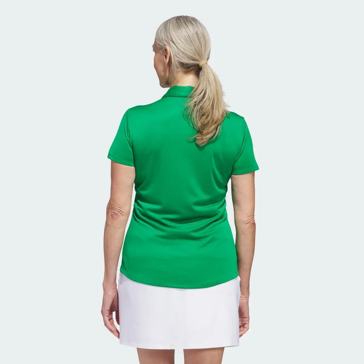 Adidas Women's Solid Performance Short Sleeve Polo Shirt. 3