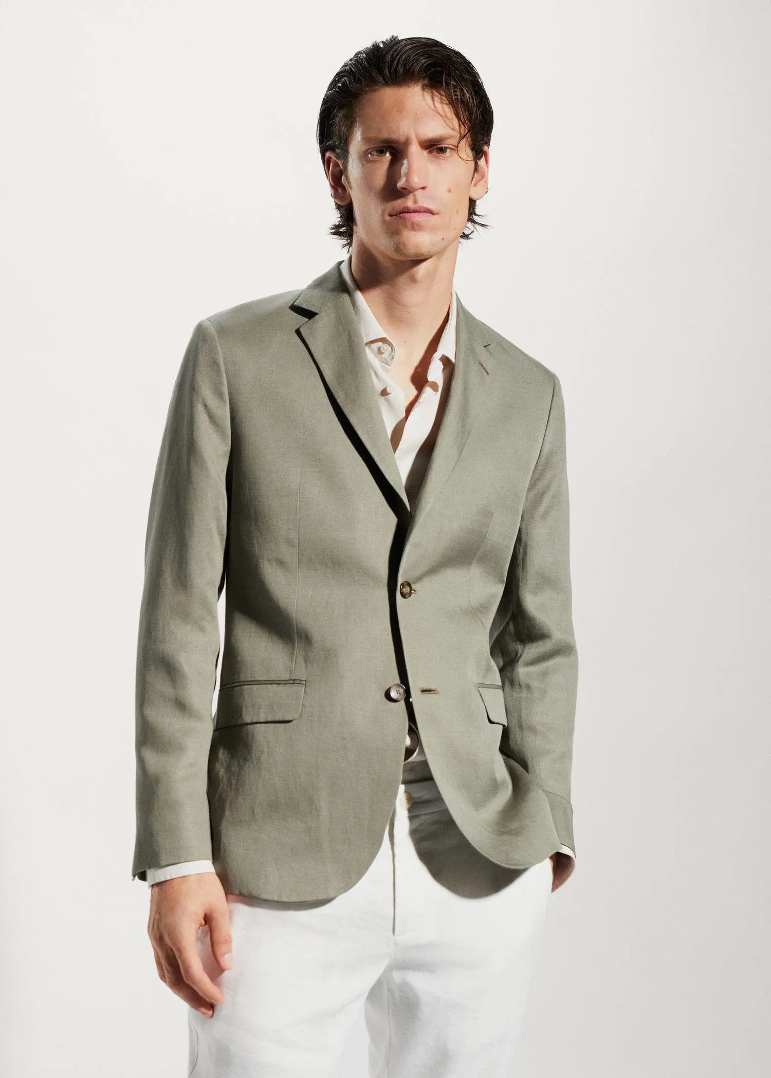 Mango Slim fit linen suit blazer. a man wearing a suit and a white shirt. 