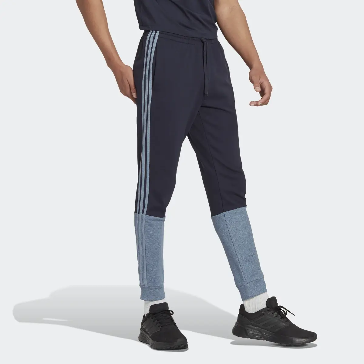 Adidas Essentials Mélange French Terry Joggers. 3