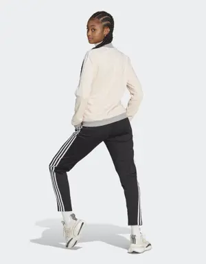 Adidas Essentials 3-Stripes Track Suit. 3 Adidas Essentials 3-Stripes Track Suit. 3