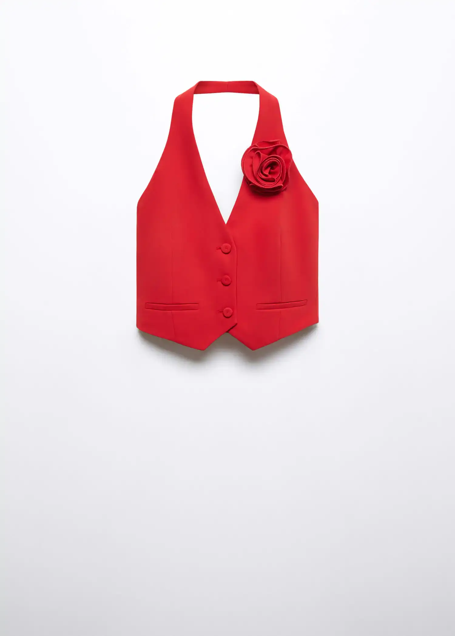 Mango Vest with floral appliqué . a red vest with a flower on the front. 