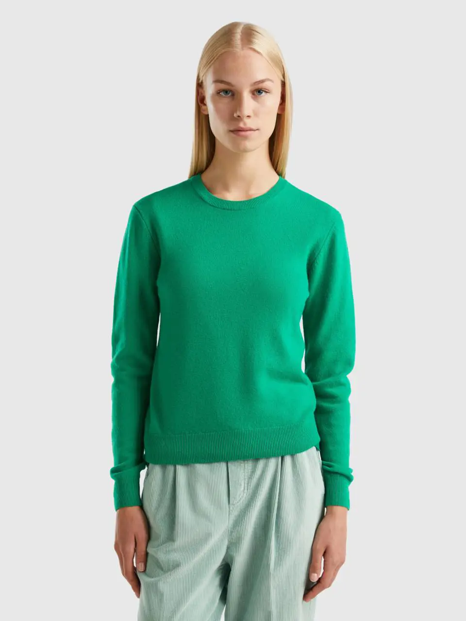 Benetton green crew neck sweater in merino wool. 1